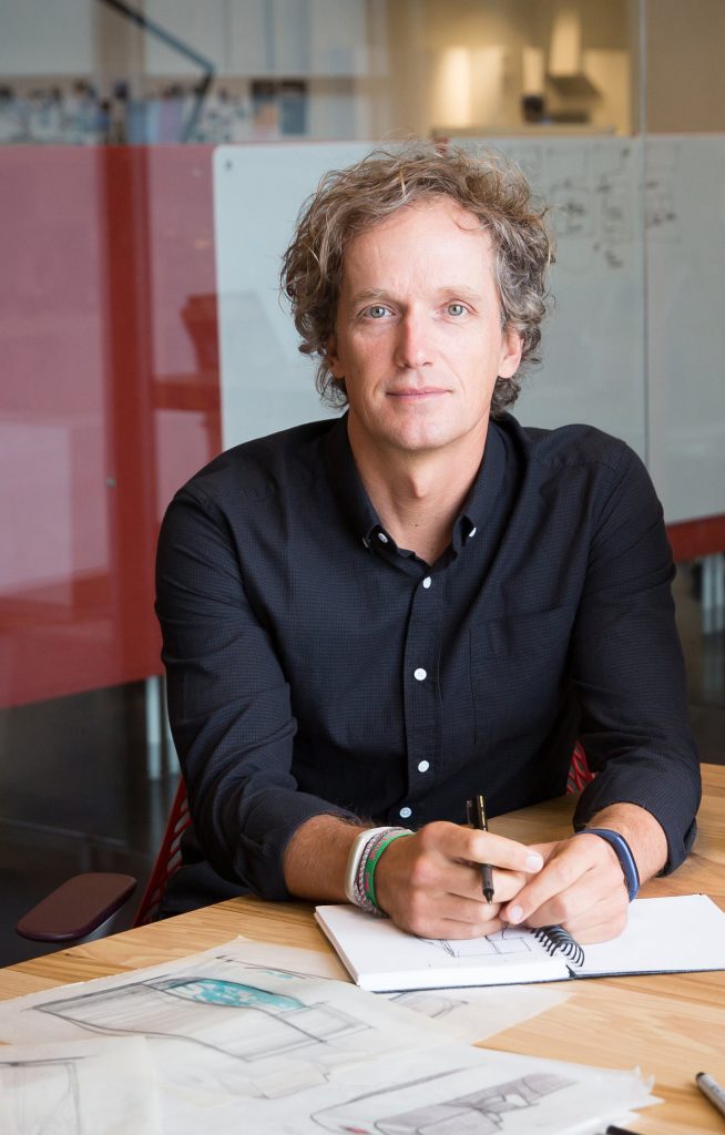 Yves Behar sitting at a desk