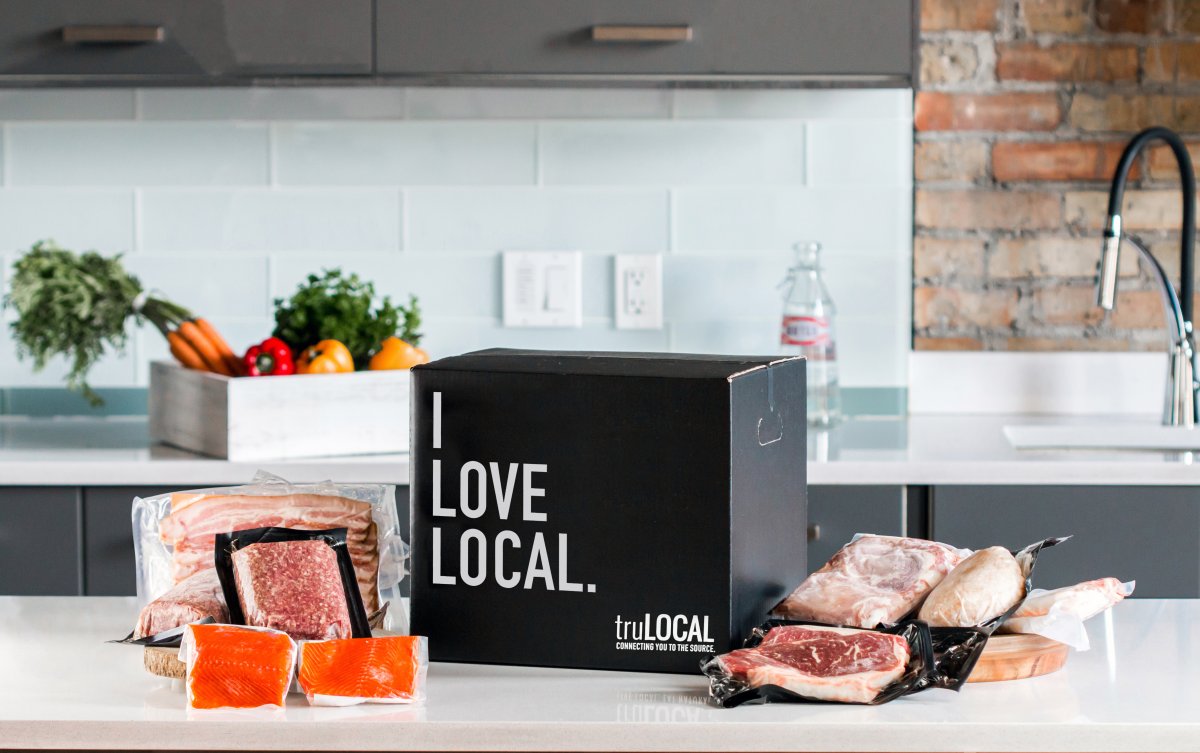 A black box that says "I Love Local" surrounded by truLOCAL products.