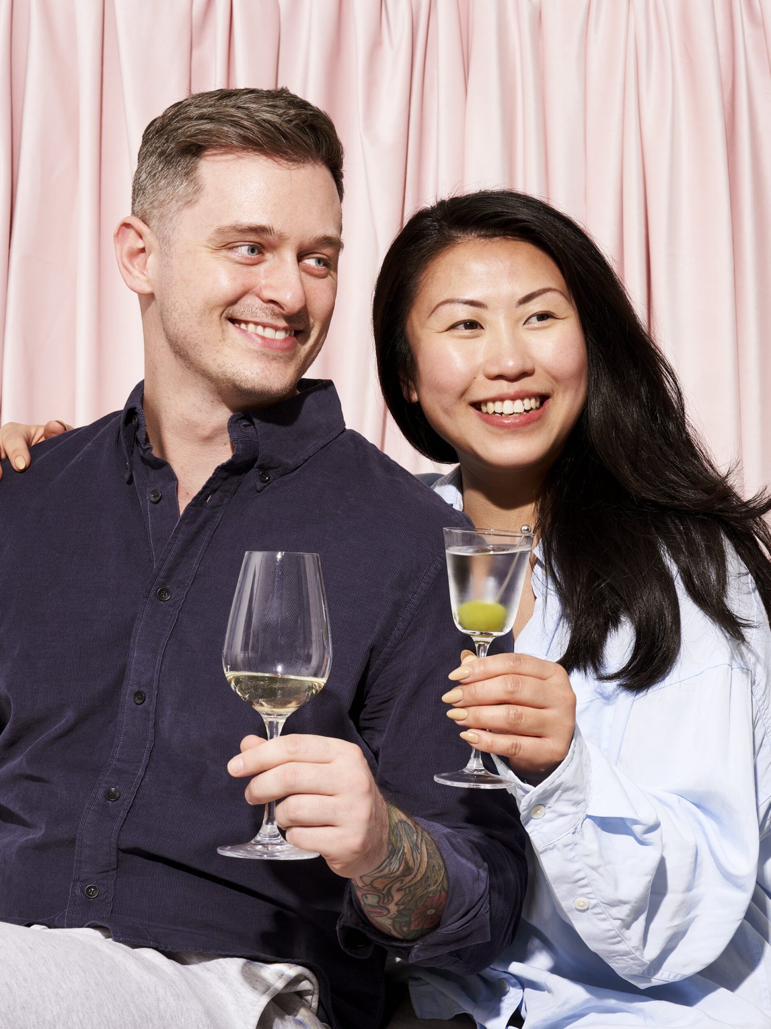 Evelyn Chick and Justin holding glassware