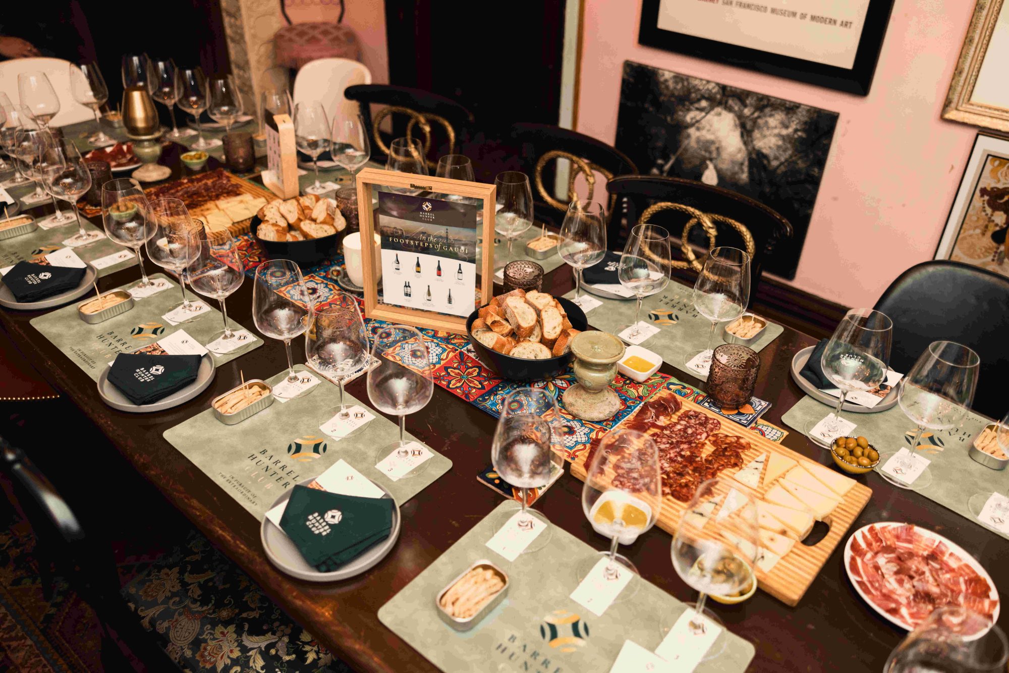 Table with whisky tasting glasses and other items.